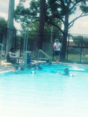 Oh look, I found the lifeguards.  All huddled in one corner of the pool while the kids do their own thing.