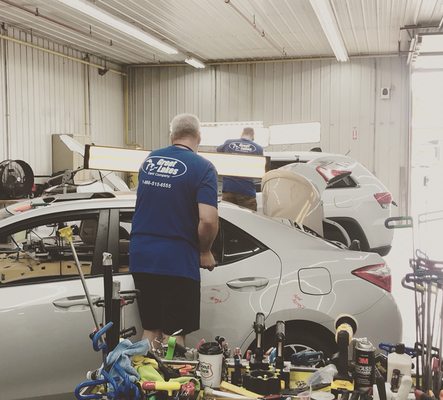 The Crew repairing hail damaged vehicles for our bodyshop customers.