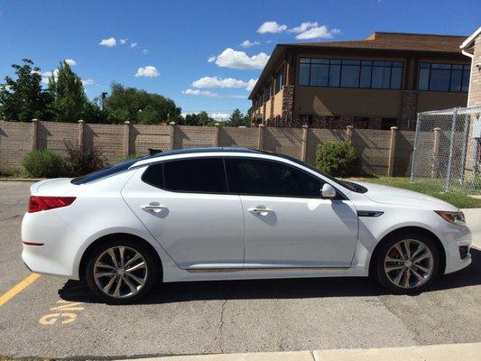 2014 Kia Optima with 3M Color Stable 5% on the rear and Color Stable 50% film on the front doors