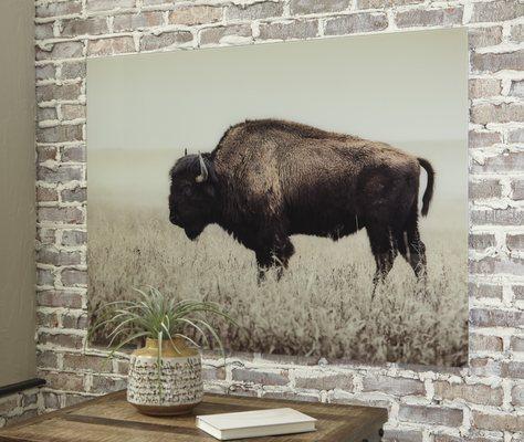 Add a touch of rustic refinement to your decor with this unique sepia wall art. Glass reproduction of a lone bison calls to mind tintype pho