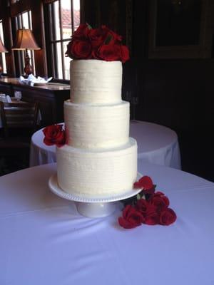 Elegant rose topped cake.