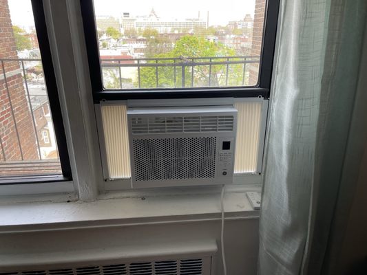 Ac installed with state compliant window bracket.