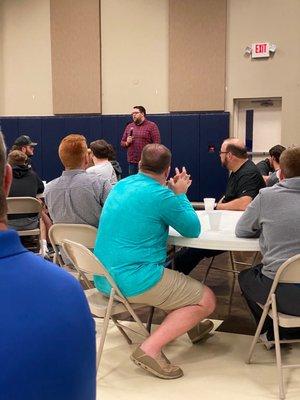 Men's ministry meeting in the gymnasium