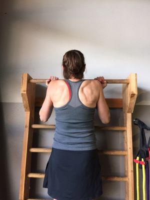 Stall bar pull-ups