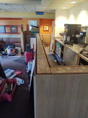 Local restaurant remodel, the half wall gets its new cap and screens.