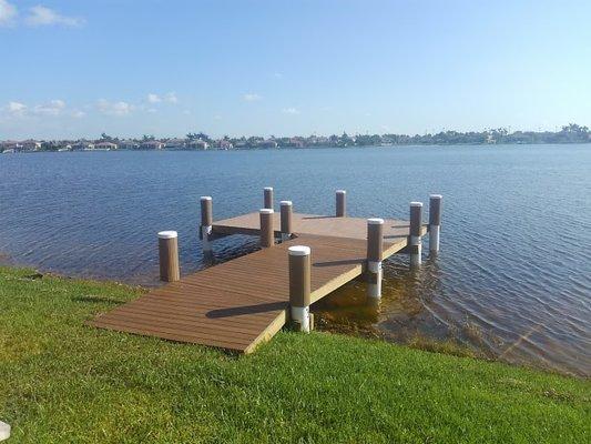 Brand new 'L' shaped dock on a lake.