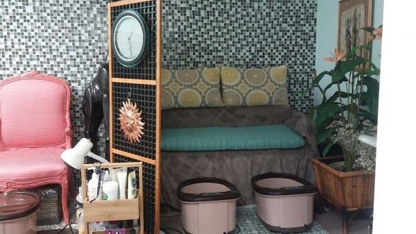 a cozy  area , easy to get in and out of the chairs .enjoy a cup of tea or coffee while relaxing  The tubs, vibrate,massage and heat .