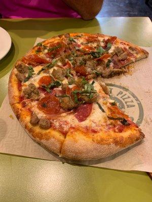 Carne di Italia pizza.  13 inch with pepperoni, salami, sausage, meatballs and prosciutto and basil on traditional crust.  $16.99