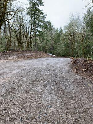 access road looking down towards the road from the end of the well drilling pad.