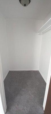 Freshly painted closet with brand new Ash Grey carpet.