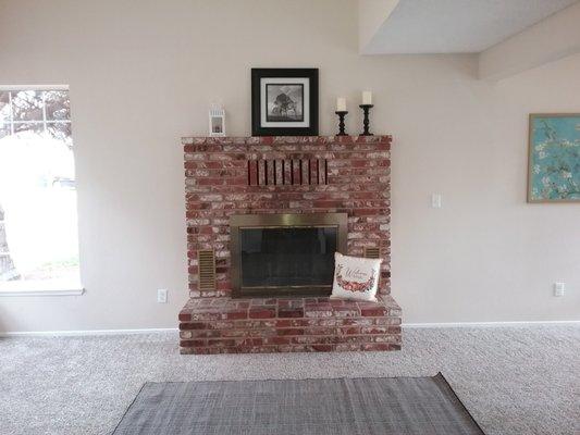 Accentuating the focal point of the living space at a home we staged here in town.