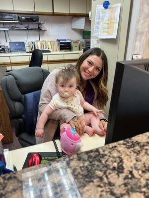 Jayna holding one of our youngest patients!