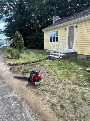 Done Right Landscape removed the cracked asphalt walkway of this home...