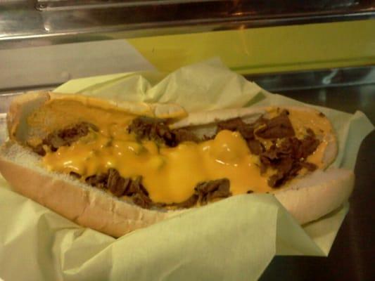 Whole cheesesteak, wiz.