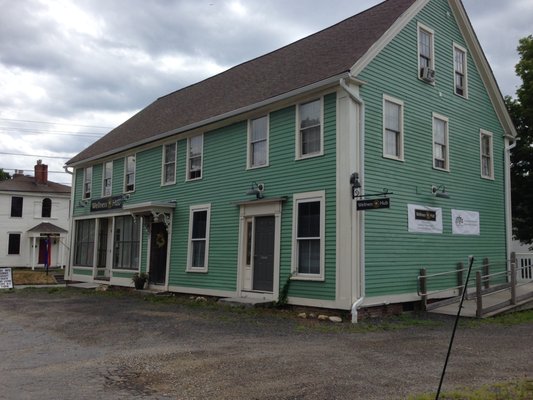 our building, entrance in rear (up ramp in right side of pic)