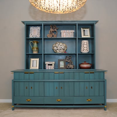 Custom cabinet and luxurious chandelier. Design by AFP Interiors.