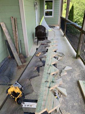 Replacing stringers for deck stairwell.