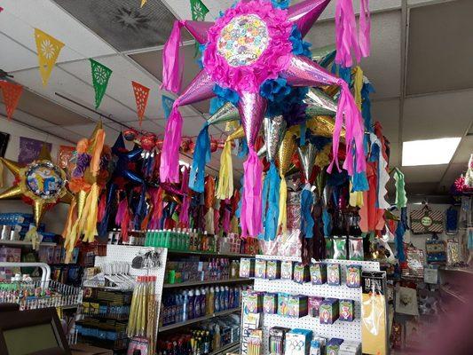 Pinatas, birthday candles, gift bags.