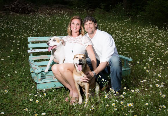 Dr. Maddux, his wife Christen, and Savannah and Lucy.