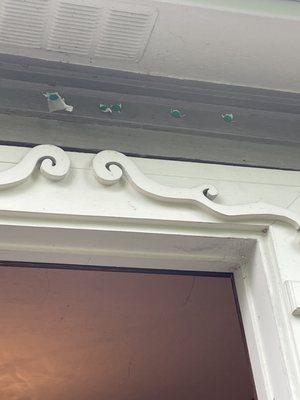 Left green giant nails and plastic hanging all around my mother's door.