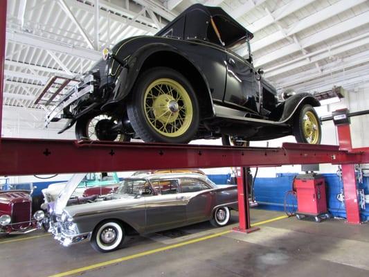 1957 Ford Fairlane Supercharged 4 door sedan and 1930 Model A in our climate controlled facility.