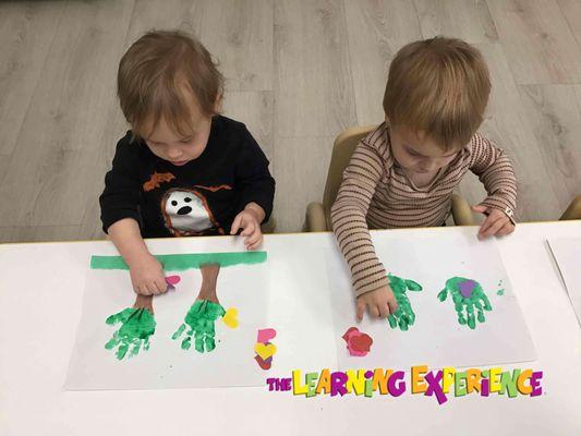 Toddler Classroom talking about nature today, they created hand print trees