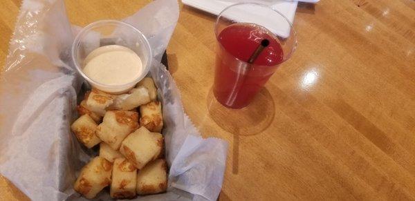 Cheese curds and a cocktail