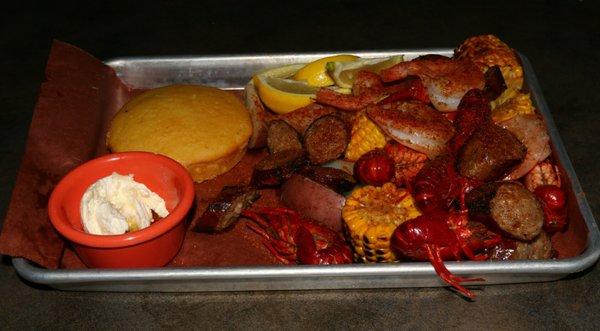 Crawfish, shrimp, sausage, potatoes, corn on the cob and corn bread. I feel like I'm in Louisiana.