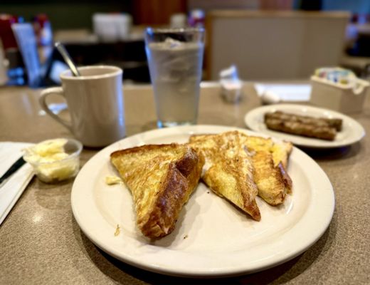 French toast, coffee, and sausage links.