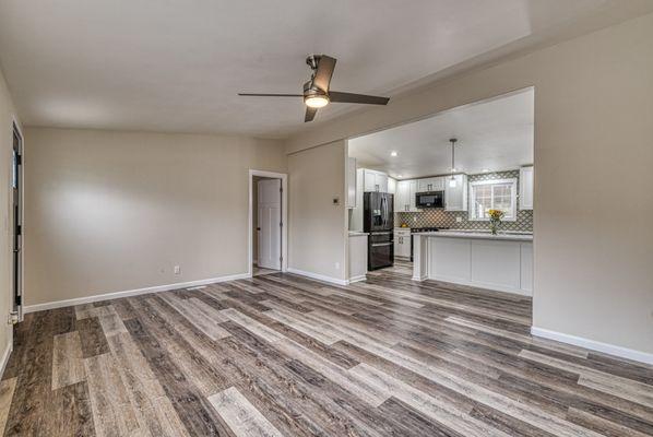 Carpet removed and all new LVT flooring placed throughout, excluding the bedrooms. Durable and water resistant.