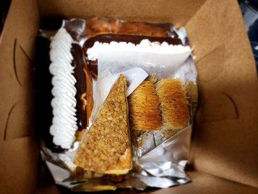 My to go hoard! 2 eclairs, baklava cheesecake, 2 Kataifi.