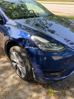 2020 Tesla right side front and side damages.