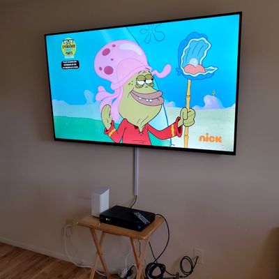 65" basic TV mounting in a beautiful living room