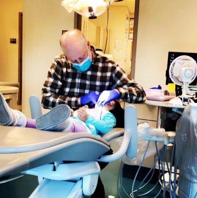 Dr. Kizer talked to my girl first and let her feel comfy. He also let her hold instruments and guess how many teeth she had.