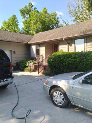 Driveway pressure washing and whole exterior repaint.