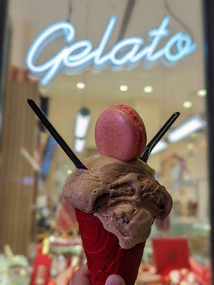 Signature cone - 1 scoop cappacino, 1 scoop dulce de leche in a red velvet cone topped with a rose petal macaron