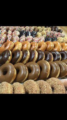 Variety of raised and cake donuts.