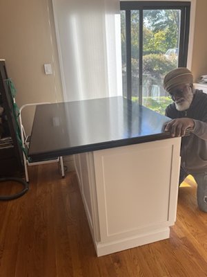 Refinished and installed walnut counter top.