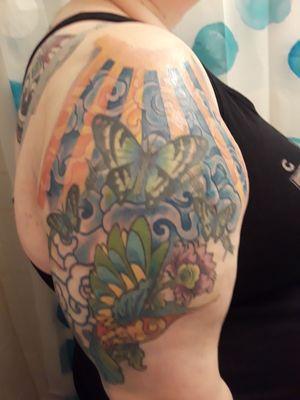 My tattoo. I had butterflies and a hummingbird previously.