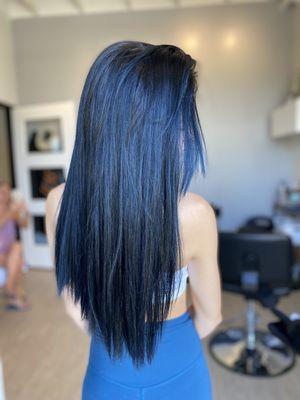 Dark blue vivid highlights on black hair