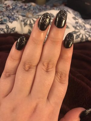 Black oval with half sparkle shellac on top of acrylic