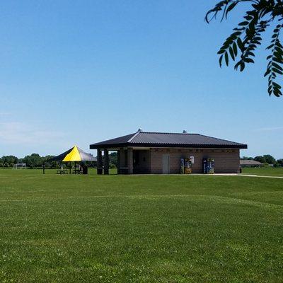 Central facility and a shade tent