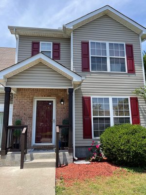 Exterior shutters and front door painted