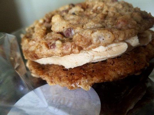 Signature Gigi cookie sandwich. Rice krispies, chocolate chips, and I don't know what else cookie, with cookie dough icing in the middle.