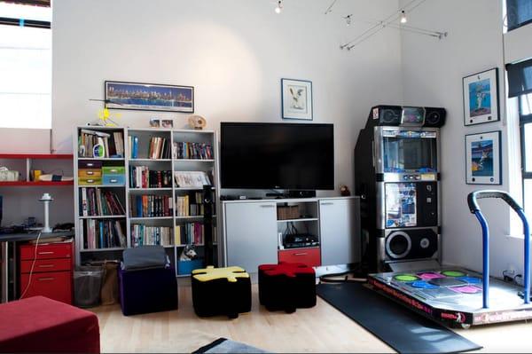 The storage to the right of the bookshelves (under the TV) was added years after original remodel yet blended in perfectly.