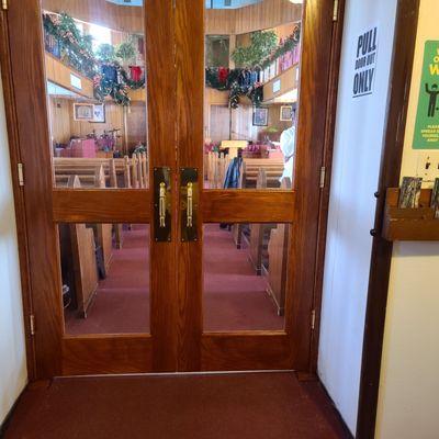 Sanctuary doors, stained and installed.