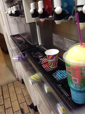 The whole countertop and even the Cups are all dirty there covered in melted Slurpee!!!