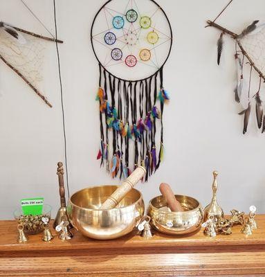 Meditation tools available at Little Rock and Gem Shop, including singing bowls, bells, sage, etc.