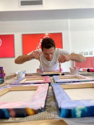 Adam Vlux working on some of his sale pieces in preparation for his event at theART-Dept.