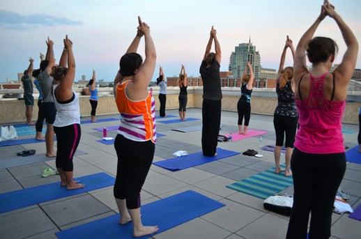 Moonlight Yoga overlooking Forest Park. Plus a great view of the Arch.